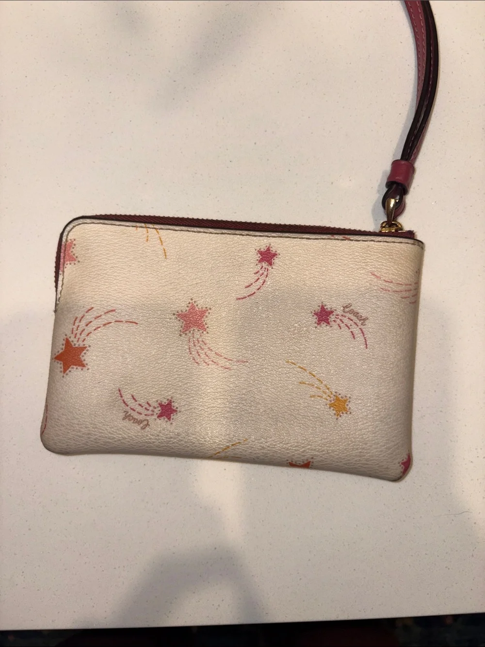 HEAVILY USED Coach Cream Star-Print Wristlet